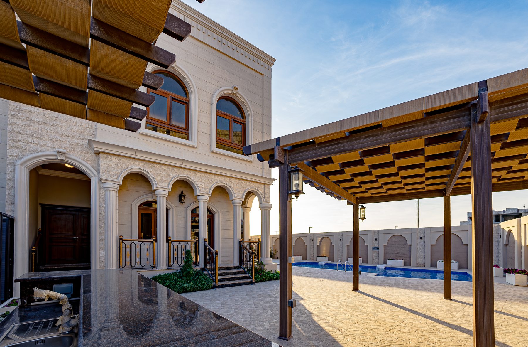 Exterior arrival with pool